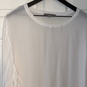 Terribly versatile top.  Can be worn with jeans +